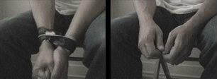 Two-channel video still: on the left a pair of hands bound at the wrist, on the right the same hands working free